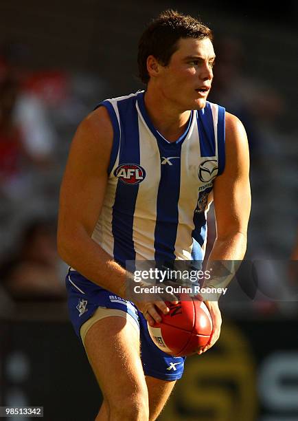 Nathan Grima of the Kangaroos looks to kick during the round four AFL match between the North Melbourne Kangaroos and the Sydney Swans at Etihad...