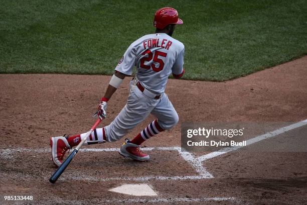 Dexter Fowler of the St. Louis Cardinals grounds into a fielder's choice in the sixth inning against the Milwaukee Brewers at Miller Park on June 24,...