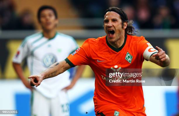 Torsten Frings of celebrates after he scores his team's third goal during the Bundesliga match between VfL Wolfsburg and SV Werder Bremen at the...