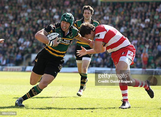 Bruce Reihana of Northampton is held by Jonny May during the Guinness Premiership match between Northampton Saints and Gloucester at Franklin's...