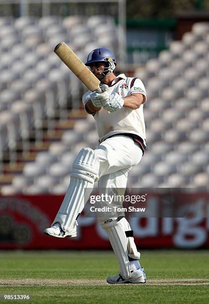Sajid Mahmood of Lancashire hits out during the LV County Championship match between Lancashire and Warwickshire at Old Trafford on April 17, 2010 in...