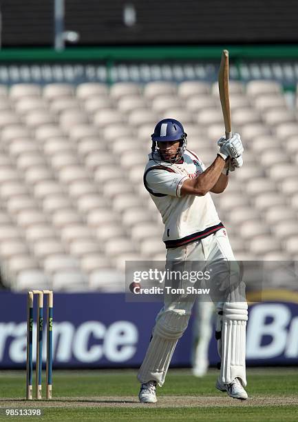 Sajid Mahmood of Lancashire hits out during the LV County Championship match between Lancashire and Warwickshire at Old Trafford on April 17, 2010 in...