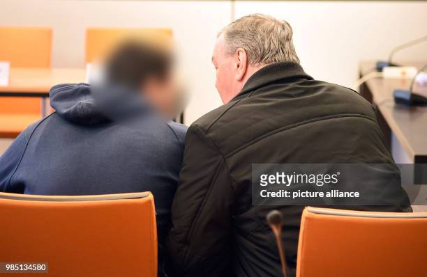 The defendant , his lawyer Raimund Mintert sit in the court of Wuppertal, Germany, 25 January 2017. The oldest son and brother-in-law of Hanaa S., a...