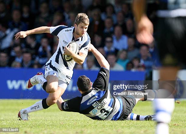 Richard Wigglesworth of Sale breaks through the tackle of Duncan Bell of Bath during the Guinness Premiership match between Bath and Sale Sharks at...