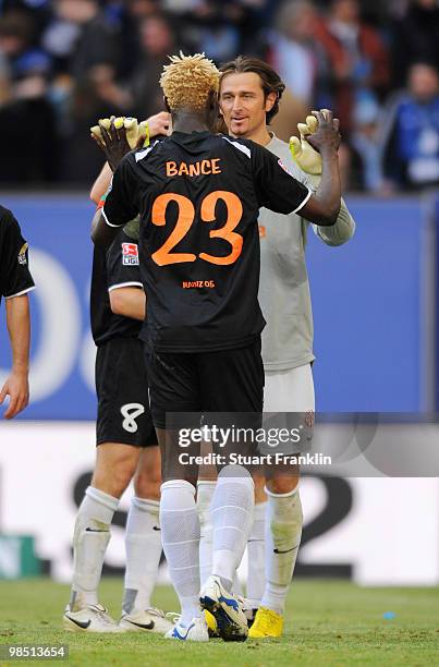 Aristide Bance and goalkeeper Heinz Mueller of Mainz celebrate after the Bundesliga match between Hamburger SV and FSV Mainz 05 at HSH Nordbank Arena...