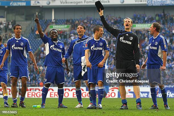 Joel Matip, Gerald Asamoah, Kevin Kuranyi, Lukas Schmitz, Manuel Neuer and Benedikt Hoewedes of Schalke celebrate the 3-1 victory after the...