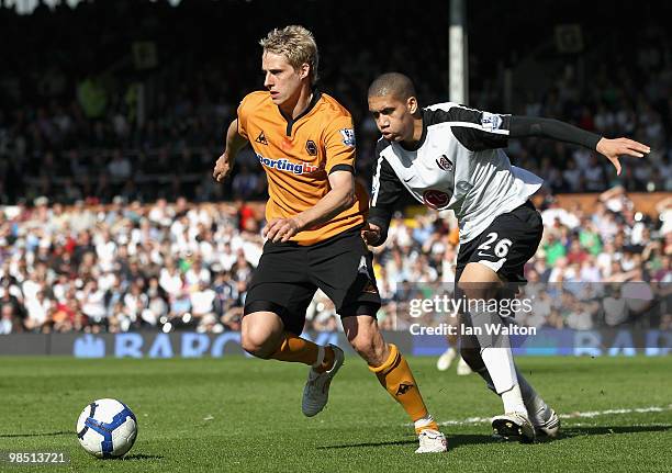 David Edwards of Wolves is closed down by Chris Smalling of Fulham during the Barclays Premier League match between Fulham and Wolverhampton...