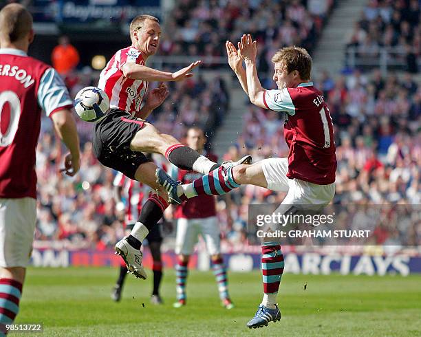 Sunderland's Irish midfielder David Meyler vies with Burnley's English midfielder Wade Elliott during the English Premier League football match...