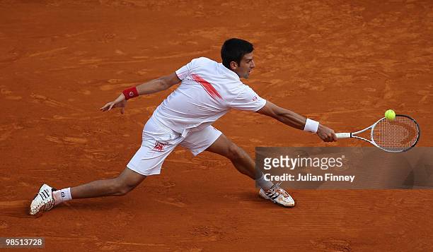 Novak Djokovic of Serbia in action against Fernando Verdasco of Spain during day six of the ATP Masters Series at the Monte Carlo Country Club on...