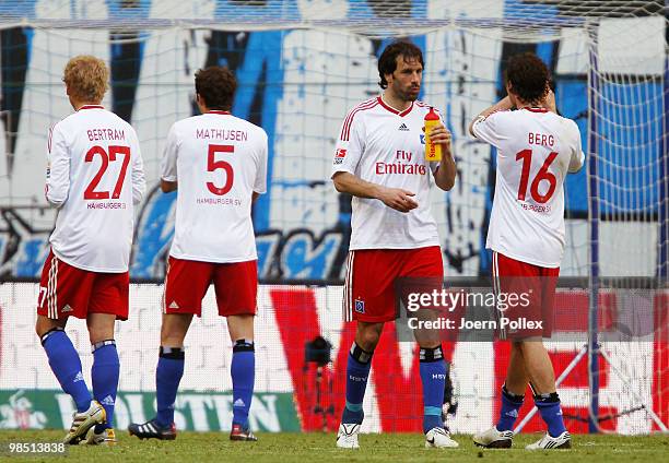 Player of Hamburg look dejected after the Bundesliga match between Hamburger SV and FSV Mainz 05 at HSH Nordbank Arena on April 17 in Hamburg,...