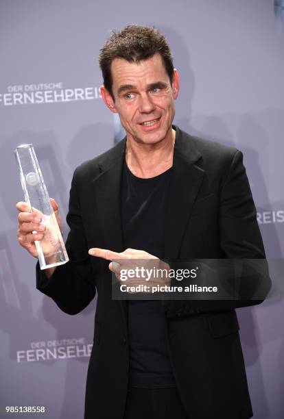 Director Tom Tykwer wins in the categroy "Best Director" at the 19th German Television Awards in the Cologne Palladium in Cologne, Germany, 26...