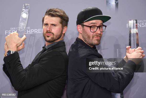 Moderator Thore Schoelermann and musician Mark Forster partake in the award ceremony for the programm "The Voice of Germany", winning in the category...