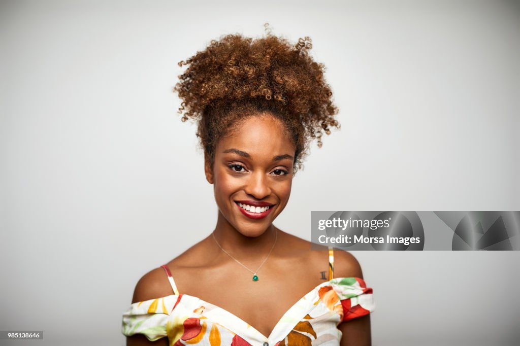 Portrait of beautiful woman with curly hair