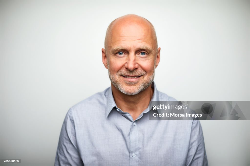 Portrait of senior businessman smiling