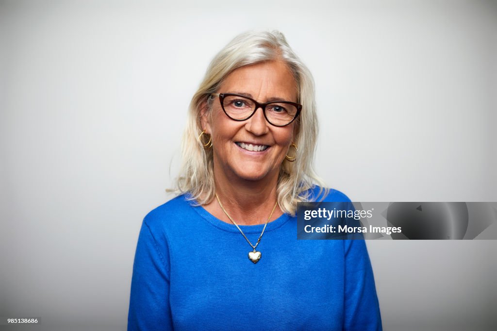 Smiling senior woman wearing eyeglasses