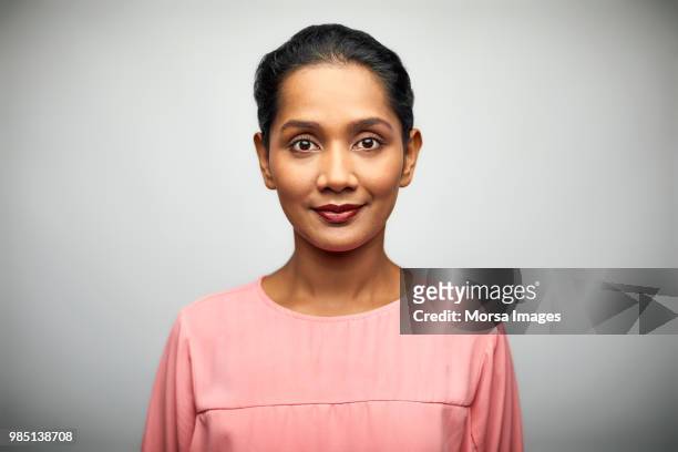 portrait of businesswoman on white background - front view stock pictures, royalty-free photos & images