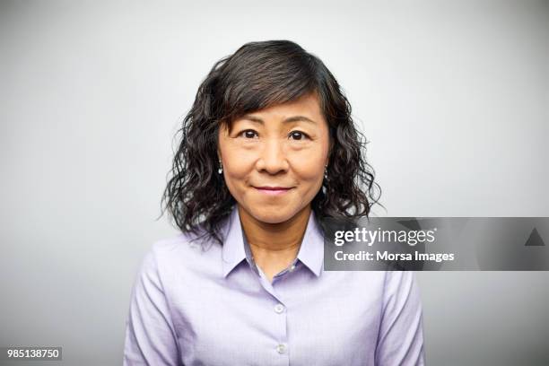 portrait of businesswoman with medium-length hair - character faces asian stock-fotos und bilder