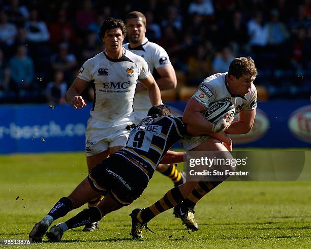 Warriors scrum half Jonny Arr tackles Wasps captain Tom Rees during the Guinness Premiership match between Worcester Warriors and London Wasps at...