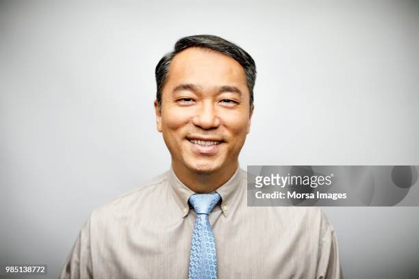portrait of businessman in formalwear smiling - asian man potrait bildbanksfoton och bilder