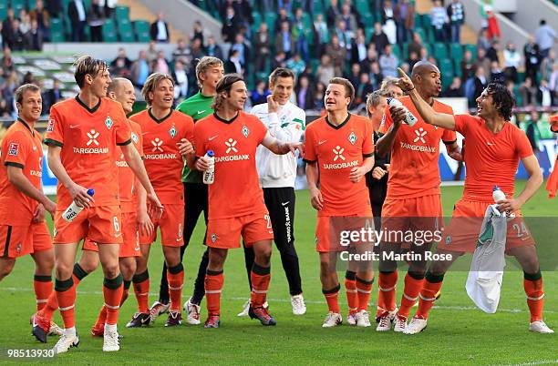 The team of Bremen celebrate after the Bundesliga match between VfL Wolfsburg and SV Werder Bremen at the Volkswagen Arena on April 17, 2010 in...