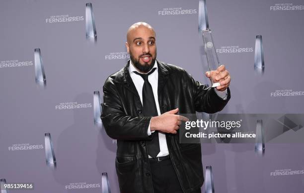 The moderator Abdelkarim Zemhoute accepts the award in the category "Best Information" for his show "Endlich Klartext! - Der große RTL II...