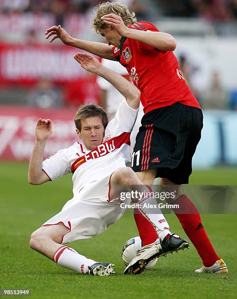 Stefan Kiessling of Leverkusen is challenged by Aliaksandr Hleb of Stuttgart during the Bundesliga match between VfB Stuttgart and Bayer Leverkusen...