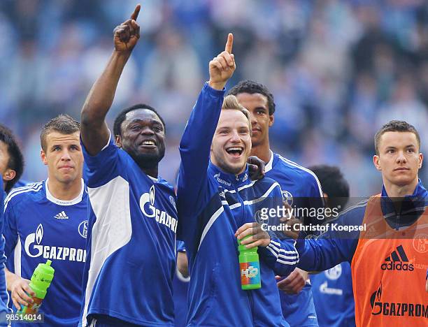 Lukas Schmitz, Gerald Asamoah, Ivan Rakitic, Joel Matip and Alexander Baumjohann of Schalke celebrate the 3-1 victory after the Bundesliga match...