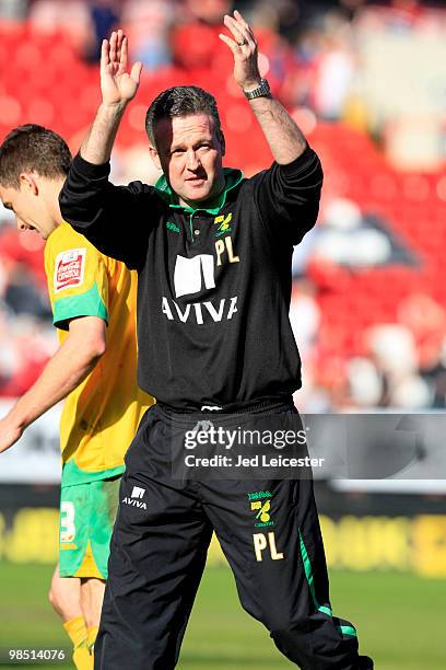 Norwich City manager Paul Lambert celebrates promotion to the Championship at the end of the Coca-Cola League One match between Charlton Athletic and...