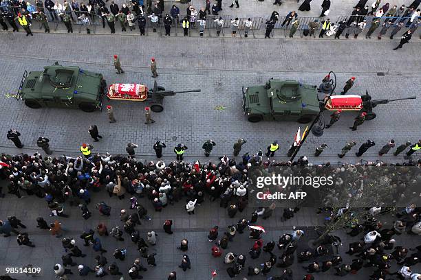 Photo taken on April 17, 2010 in Warsaw shows the casket of late Polish President Lech Kaczynski nad his wife Marta on their way from the...