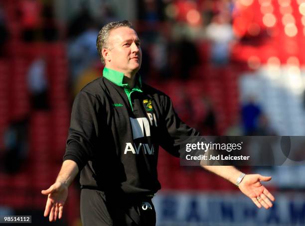 Norwich City manager Paul Lambert celebrates promotion to the Championship at the end of the Coca Cola League One match between Charlton Athletic and...