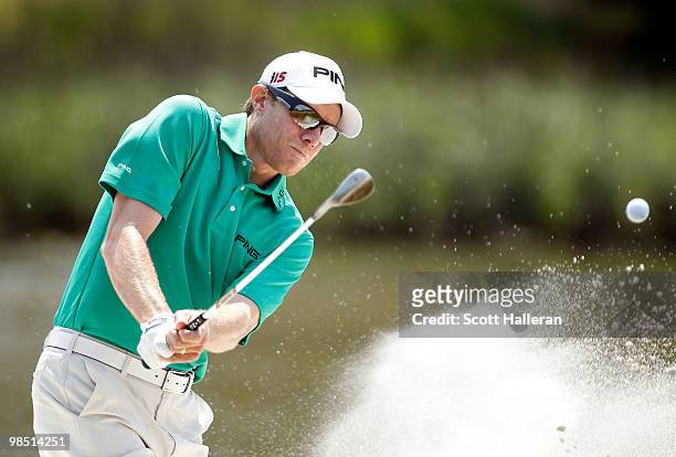 Nick O'Hern of Australia plays a bunker shot on the 17th hole during the third round of the Verizon Heritage at the Harbour Town Golf Links on April...