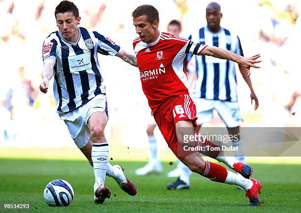 Robert Koren of West Bromwich Albion and Gary O'Neil of Middlesbrough battle for the ball during the Coca-Cola Championship match between West...