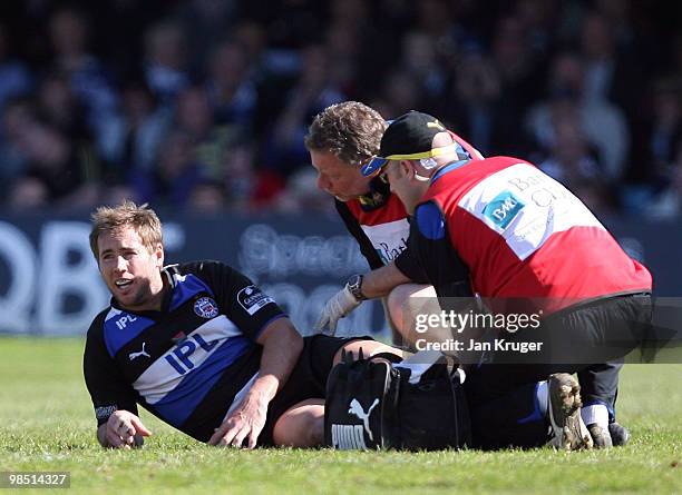 Butch James of Bath is injured during the Guinness Premiership match between Bath and Sale Sharks at the Recreation Ground on April 17, 2010 in Bath,...