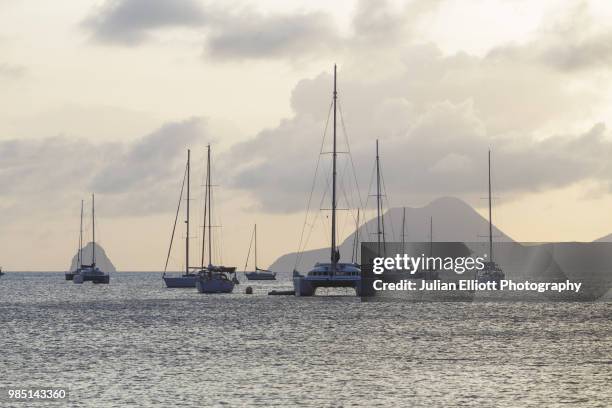 sunset at sainte anne on the island of martinique. - saint anne stock pictures, royalty-free photos & images