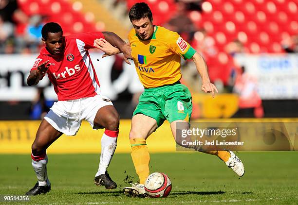 Russell Martin of Norwich City and Jose Semedo of Charlton Athletic compete for the ball during the Coca Cola League One match between Charlton...