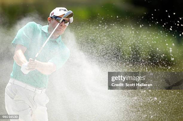 Nick O'Hern of Australia plays a bunker shot on the 17th hole during the third round of the Verizon Heritage at the Harbour Town Golf Links on April...