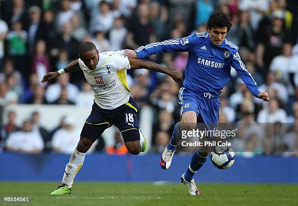 Yuri Zhirkov of Chelsea challenges Jermain Defoe of Tottenham Hotspur during the Barclays Premier League match between Tottenham Hotspur and Chelsea...