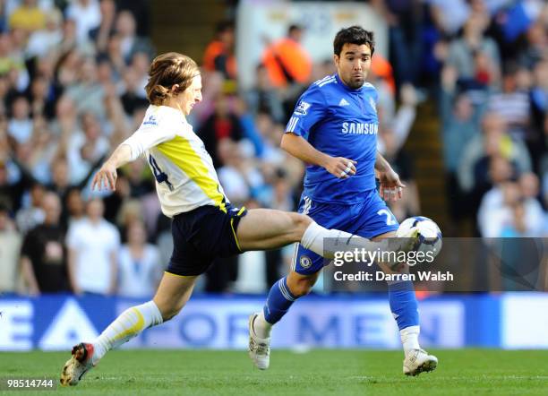 Luka Modric of Tottenham Hotspur challenges Deco of Chelsea during the Barclays Premier League match between Tottenham Hotspur and Chelsea at White...