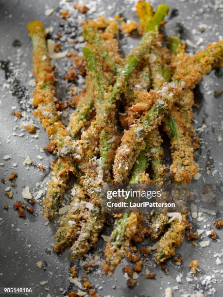 baked parmesan crusted asparagus with herbs - parmesan overhead stock pictures, royalty-free photos & images