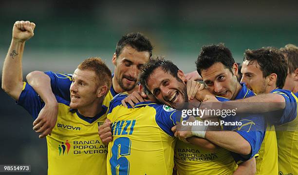 Elvis Abbruscato of Chievo celebrates after scoring his team's second goal with team mates during the Serie A match between AC Chievo Verona and AS...