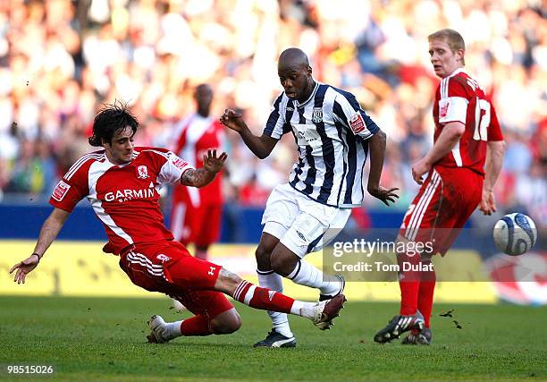 Youssouf Mulumbu of West Bromwich Albion and Rhys Williams of Middlesbrough battle for the ball during the Coca Cola Championship match between West...