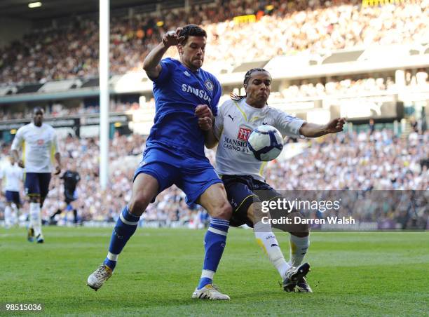 Benoit Assou-Ekotto of Tottenham Hotspur challenges Michael Ballack of Chelsea during the Barclays Premier League match between Tottenham Hotspur and...