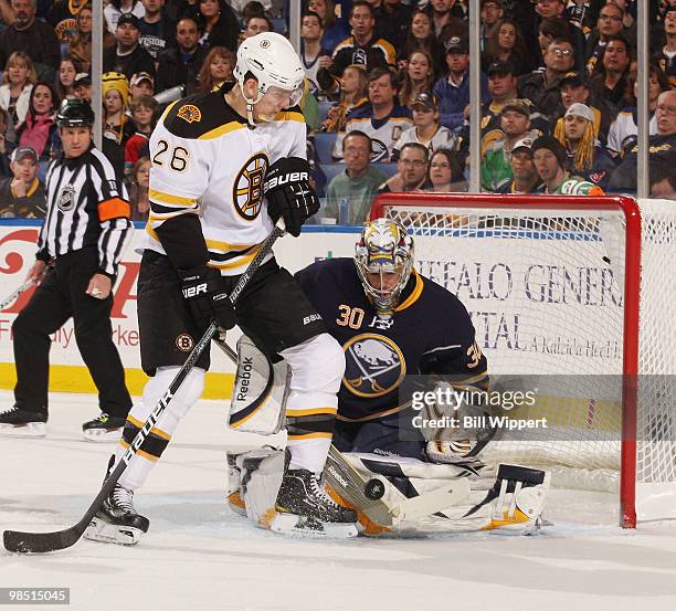 Ryan Miller of the Buffalo Sabres makes a first period save against Blake Wheeler of the Boston Bruins in Game Two of the Eastern Conference...