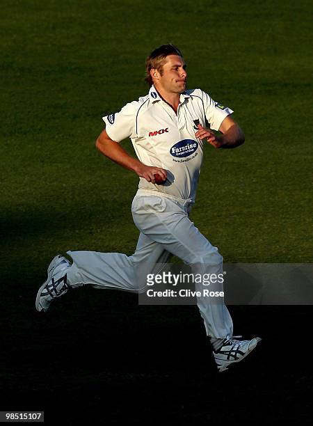 Luke Wright of Sussex runs into bowl during the LV County Championship Division Two match between Sussex and Surrey at the County Ground on April 17,...