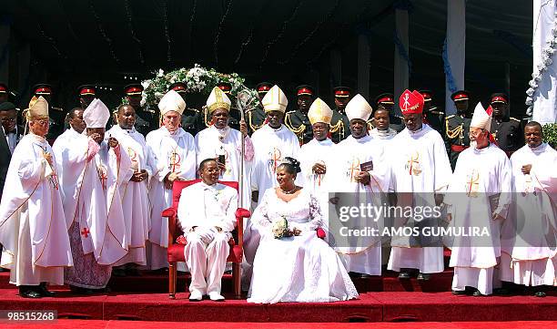 Newly wedded Malawian President Bingu wa Mutharika and his bride Callista pose with Catholic Bishops of Malawi, including the Archbishop Tarcizio...