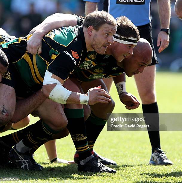 The Northampton front row Euan Murray, Dylan Hartley and Soane Tonga'huia pack down during the Guinness Premiership match between Northampton Saints...