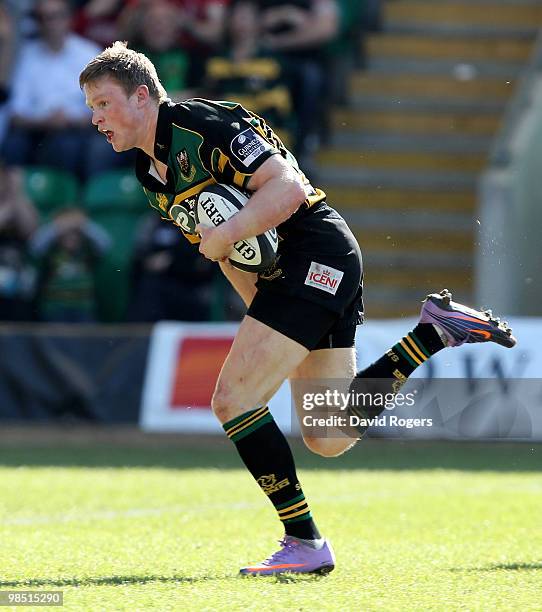 Chris Ashton of Northampton runs with the ball during the Guinness Premiership match between Northampton Saints and Gloucester at Franklin's Gardens...