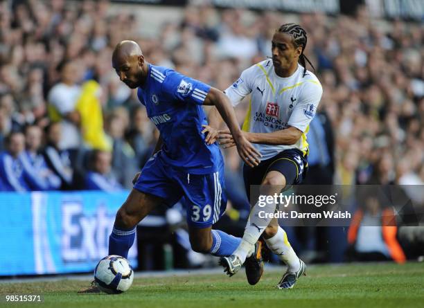 Benoit Assou-Ekotto of Tottenham Hotspur challenges Nicolas Anelka of Chelsea during the Barclays Premier League match between Tottenham Hotspur and...