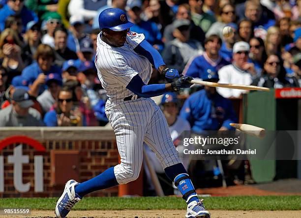 Alfonso Soriano of the Chicago Cubs breaks his bat fouling off a pitch by Roy Oswalt of the Houston Astros at Wrigley Field on April 17, 2010 in...