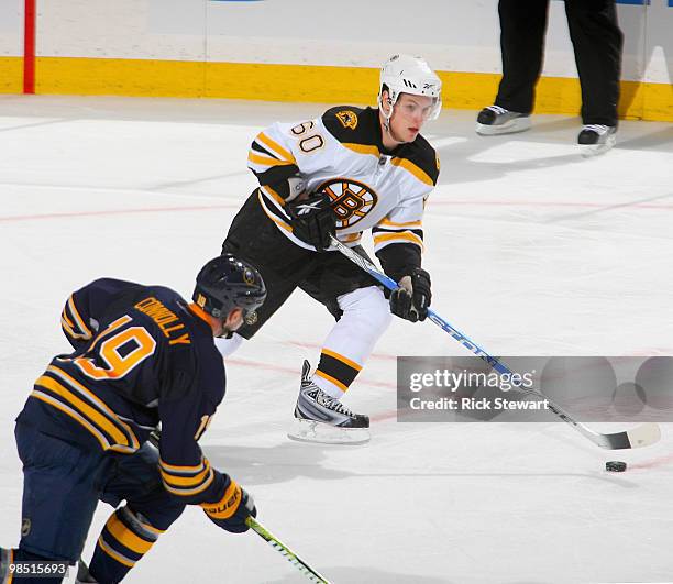 Vladimir Sobotka of the Boston Bruins carries the puck past Tim Connolly of the Buffalo Sabres in Game Two of the Eastern Conference Quarterfinals...